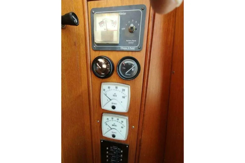 Slide: The Image of Control panel of 1996 Grand Banks Eastbay 40 Flybridge with gauges and switches. - 38