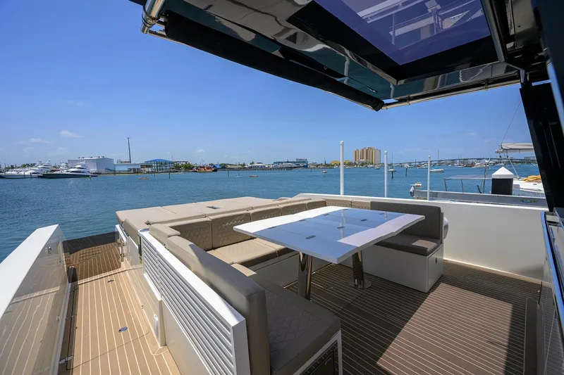 Slide: The Image of Luxurious 2023 De Antonio Yachts D42 Open with spacious deck and waterfront view. - 15