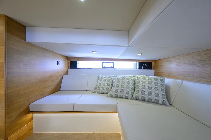 Slide: The Image of Luxurious interior of 2023 De Antonio Yachts D42 Open with elegant seating and cushions. - 46