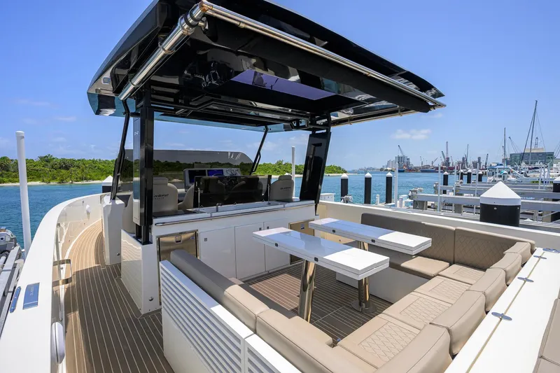Slide: The Image of 2023 De Antonio Yachts D42 Open luxury yacht with spacious seating and modern design at marina. - 13