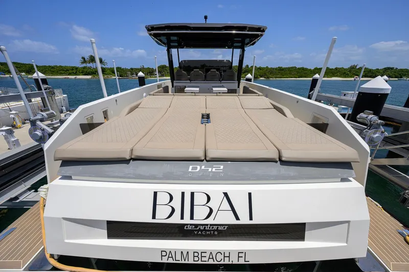 Slide: The Image of 2023 De Antonio Yachts D42 Open docked in Palm Beach, featuring spacious sunbeds. - 52