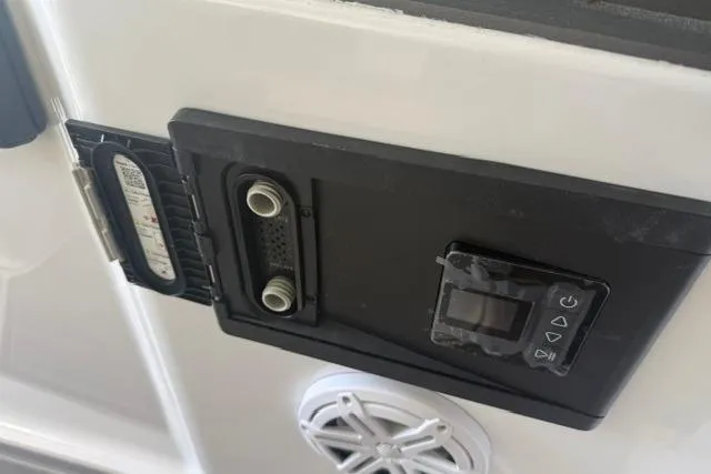 Slide: The Image of Control panel on a 2026 Monterey Elite 25 OB boat, featuring audio and connectivity ports. - 20