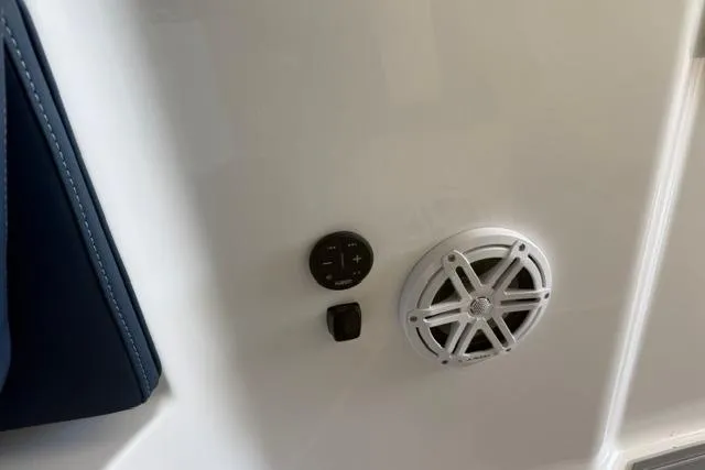 Slide: The Image of Speaker and controls on 2026 Monterey Elite 25 OB boat interior. - 22