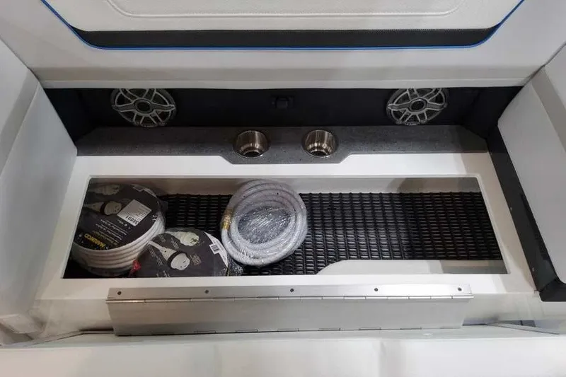 Slide: The Image of Storage compartment in 2027 Formula 360 Crossover Bowrider OB with ropes and speakers. - 33