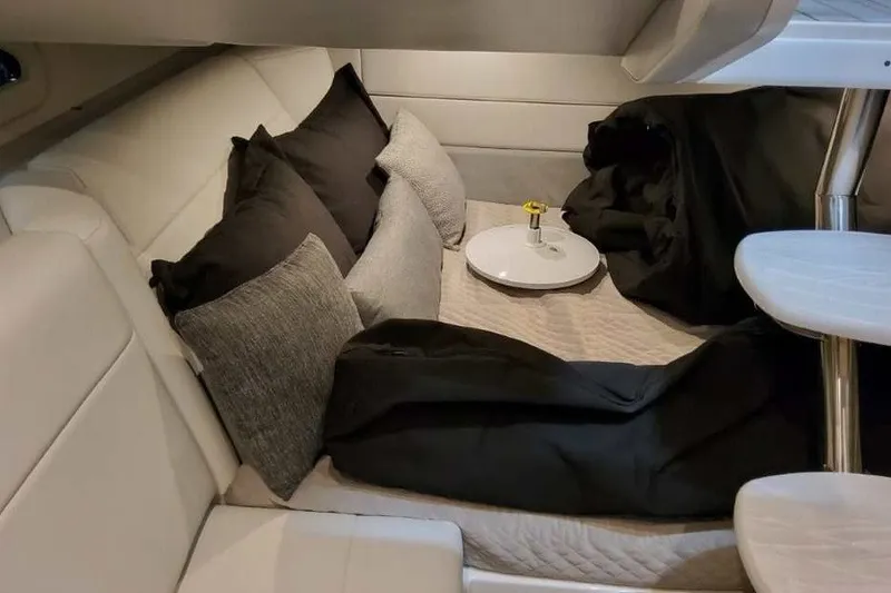 Slide: The Image of Cozy interior cabin of 2027 Formula 360 Crossover Bowrider OB with cushions and table. - 66
