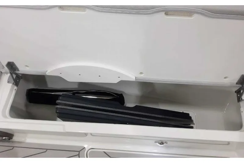 Slide: The Image of Storage compartment of 2027 Formula 360 Crossover Bowrider OB, featuring sleek interior design. - 44