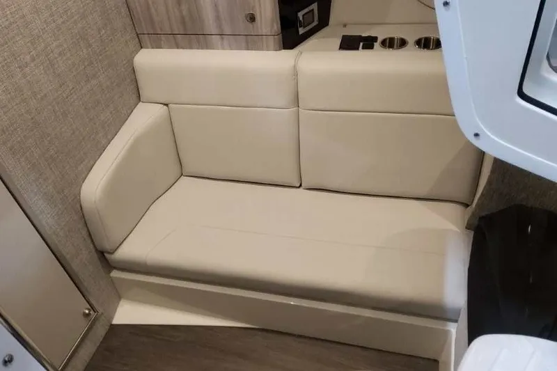 Slide: The Image of 2027 Formula 360 Crossover Bowrider OB interior with beige seating and modern design. - 62