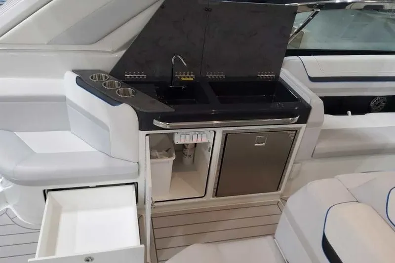 Slide: The Image of Luxury interior of 2027 Formula 360 Crossover Bowrider OB with kitchenette and seating. - 31