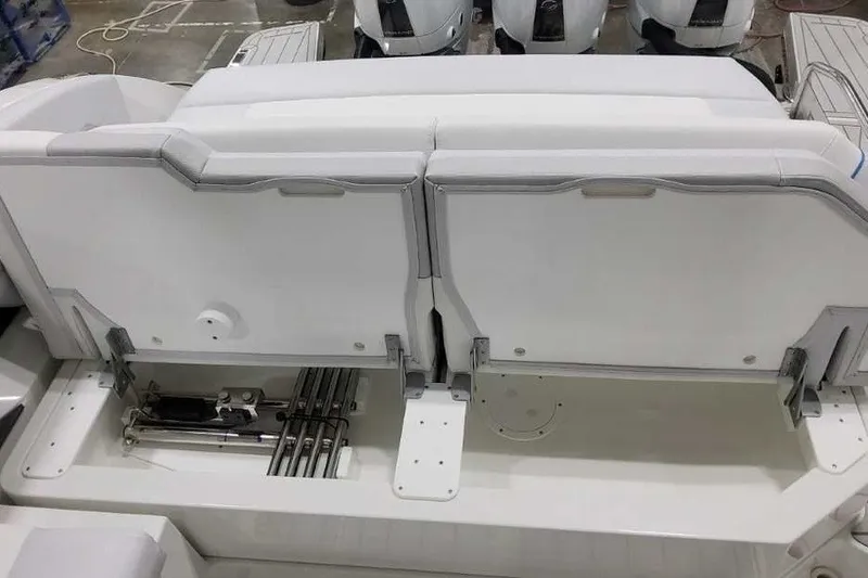 Slide: The Image of 2027 Formula 360 Crossover Bowrider OB seating area with storage compartment open. - 20