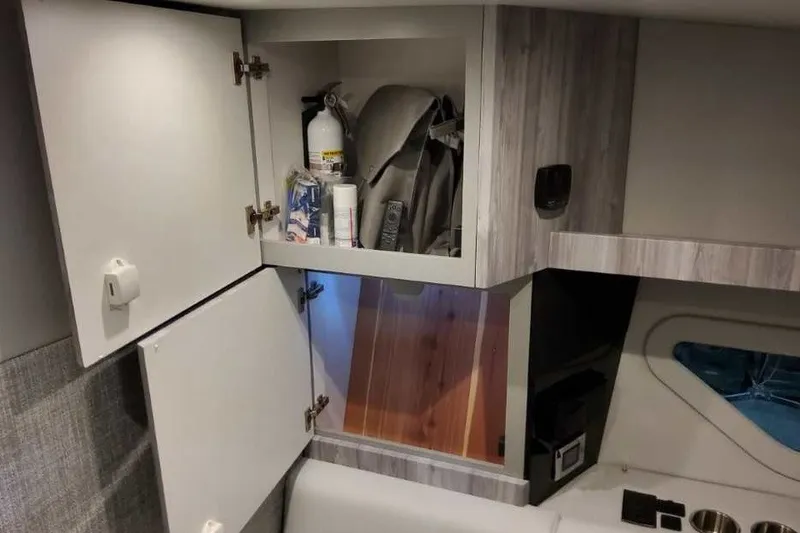 Slide: The Image of Interior storage cabinets in 2027 Formula 360 Crossover Bowrider OB boat. - 64