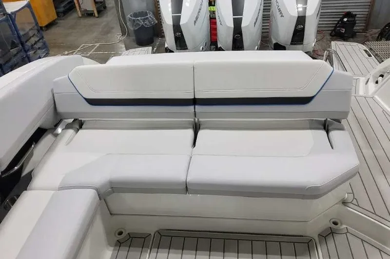 Slide: The Image of 2027 Formula 360 Crossover Bowrider OB with sleek white seating and modern design. - 19