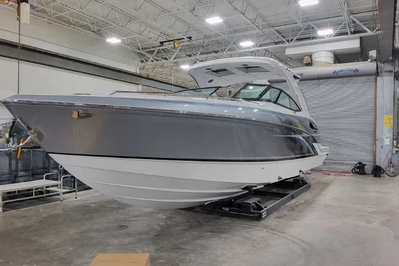 Slide: The Image of 2027 Formula 360 Crossover Bowrider OB in a warehouse setting. - 3
