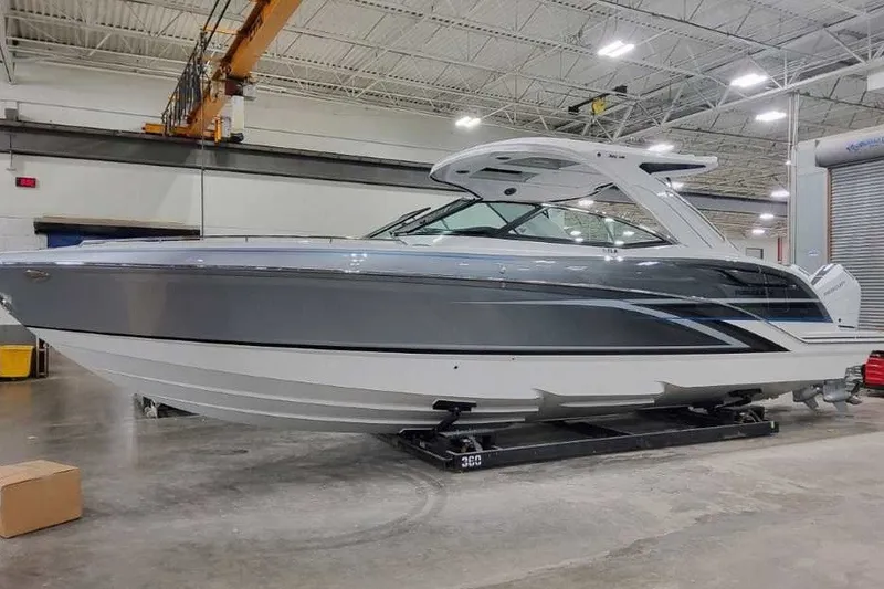 The Image of 2027 Formula 360 Crossover Bowrider OB in a showroom, showcasing sleek design and modern features. - 2