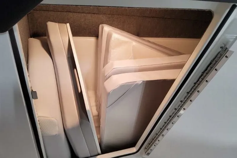 Slide: The Image of Storage compartment with cushions in a 2027 Formula 360 Crossover Bowrider OB boat. - 40