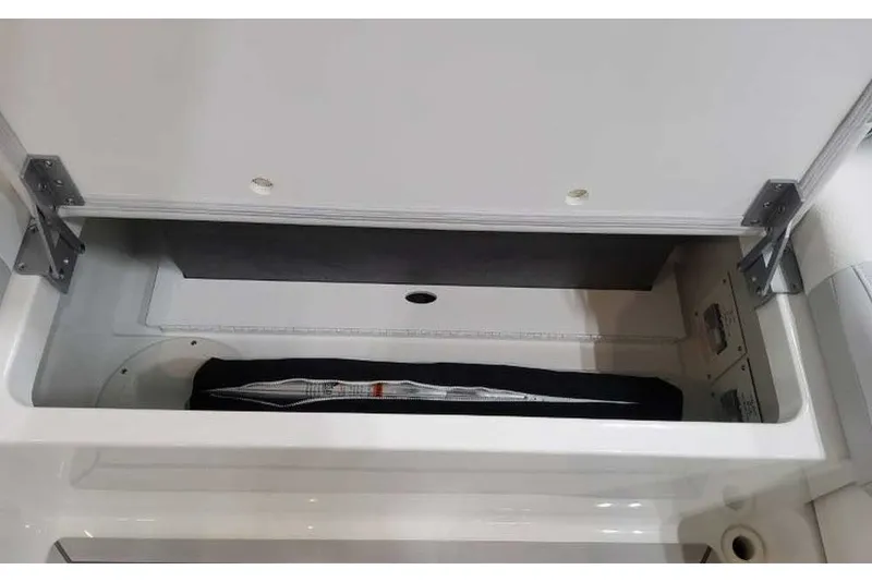 Slide: The Image of 2027 Formula 360 Crossover Bowrider OB storage compartment, open with visible interior. - 27