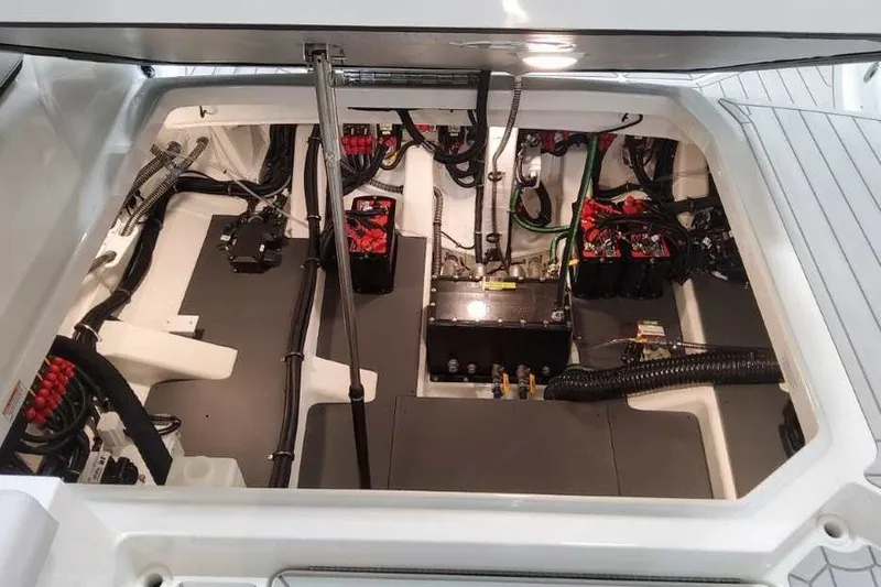 Slide: The Image of Engine compartment of 2027 Formula 360 Crossover Bowrider OB, showcasing wiring and components. - 21