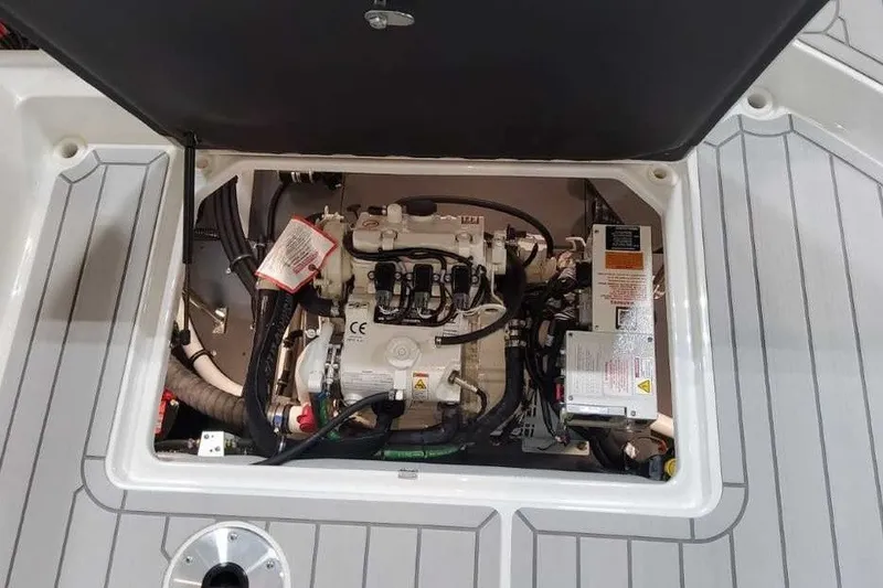 Slide: The Image of Engine compartment of 2027 Formula 360 Crossover Bowrider OB, showcasing mechanical components. - 25