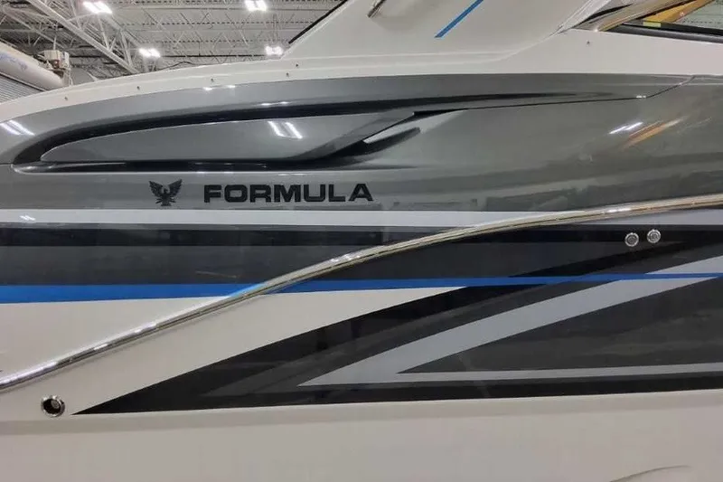 Slide: The Image of 2027 Formula 360 Crossover Bowrider OB, sleek design with modern graphics. - 7