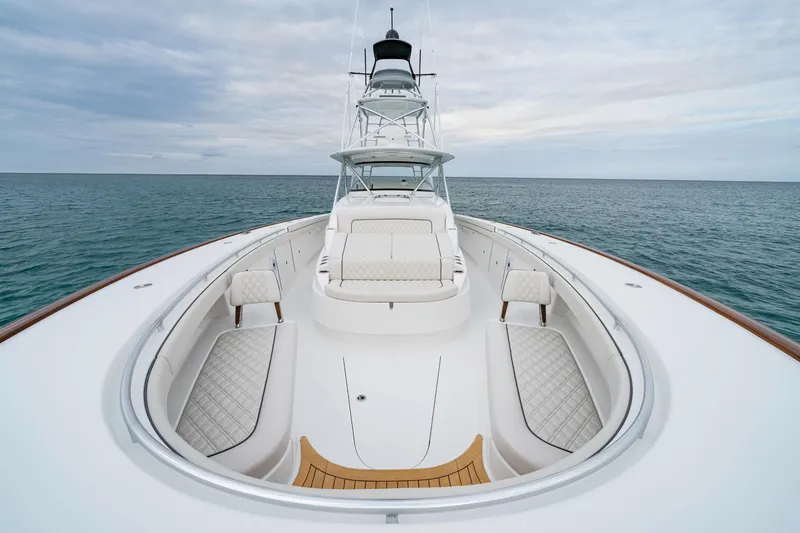 Slide: The Image of 2026 Valhalla Boatworks V-55 luxury yacht on open sea, showcasing elegant deck design. - 2