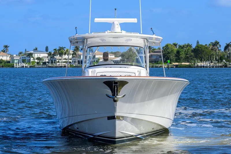 Slide: The Image of 2026 Valhalla Boatworks V-46 cruising on a sunny day, front view. - 2