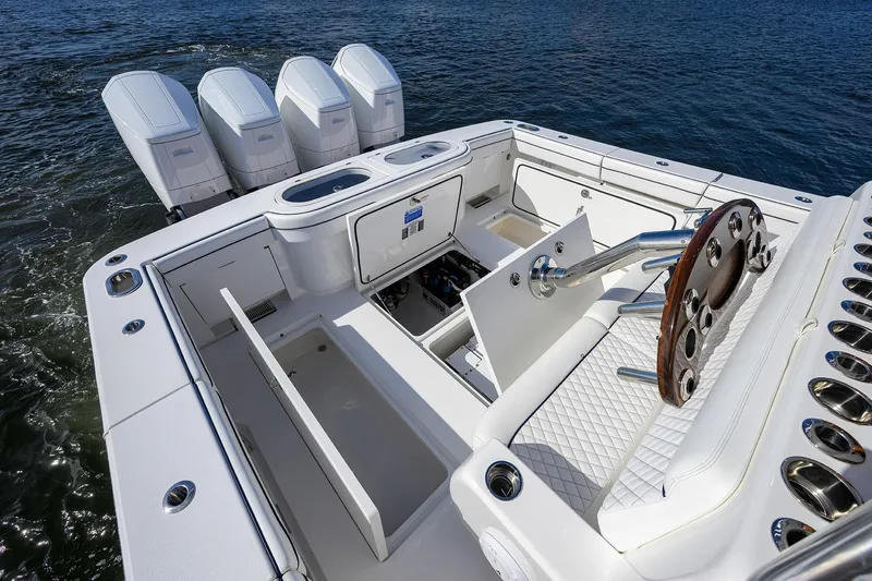 Slide: The Image of 2026 Valhalla Boatworks V-46 cockpit with four engines and luxurious seating. - 19
