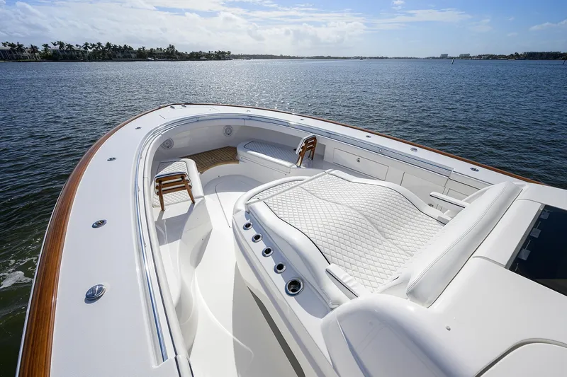 Slide: The Image of Luxurious 2026 Valhalla Boatworks V-46 yacht with elegant seating on calm waters. - 8