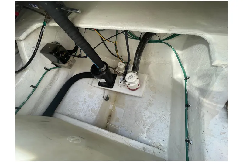 Slide: The Image of Engine compartment of 2007 Luhrs 31 Open boat, showing wiring and components. - 22