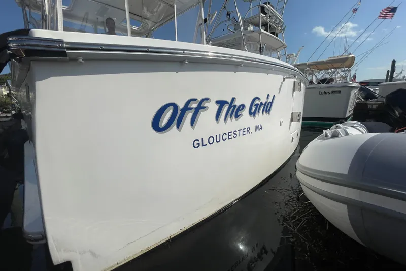 Slide: The Image of 2007 Luhrs 31 Open boat named "Off The Grid" docked in Gloucester, MA. - 3