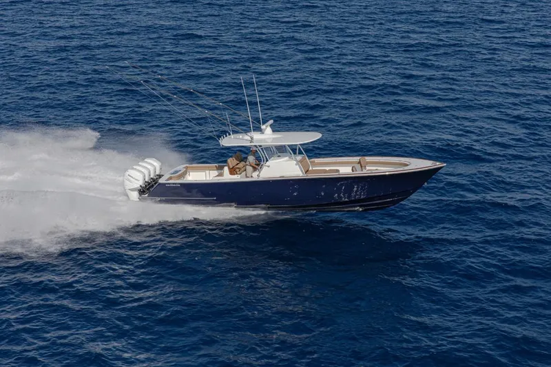 Slide: The Image of 2026 Valhalla Boatworks V-41 cruising swiftly on open blue ocean waters. - 4