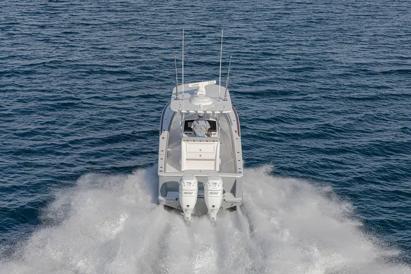 Slide: The Image of 2027 Valhalla Boatworks V-33 speeding on open water, rear view. - 7