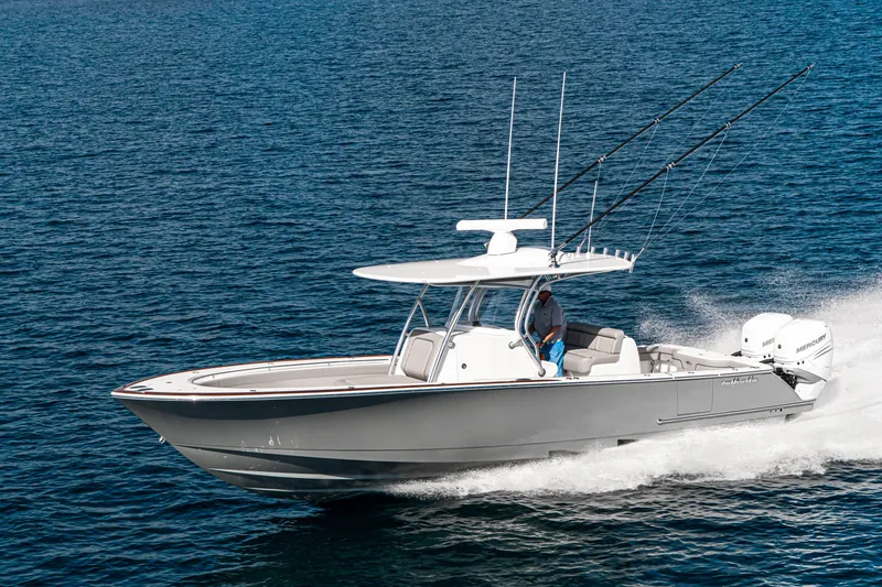 Slide: The Image of 2027 Valhalla Boatworks V-33 cruising on open water, showcasing sleek design and performance. - 3