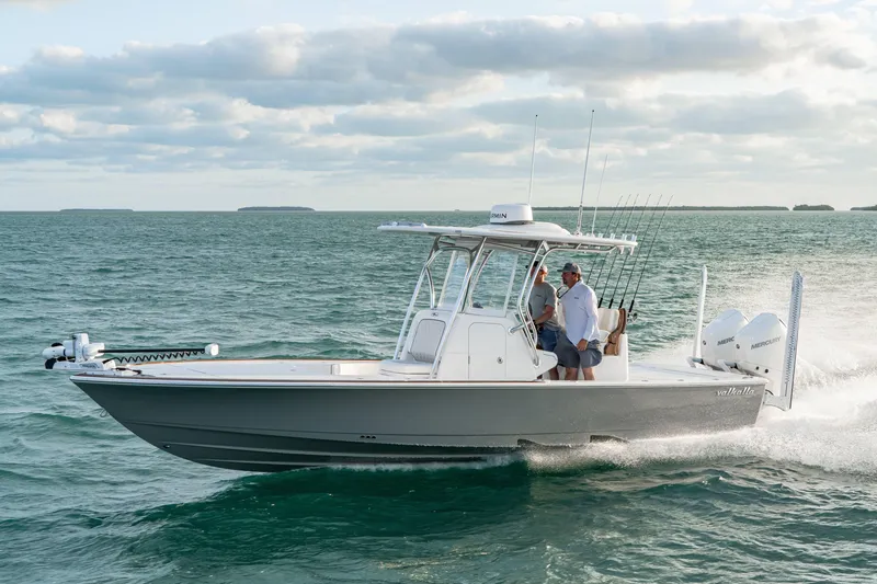 Slide: The Image of 2027 Valhalla Boatworks V-28 Bay cruising on open water under cloudy skies. - 2