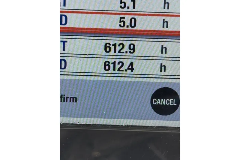 Slide: The Image of Display screen showing hours logged, with "CANCEL" button, on a 2015 Regulator 25. - 13