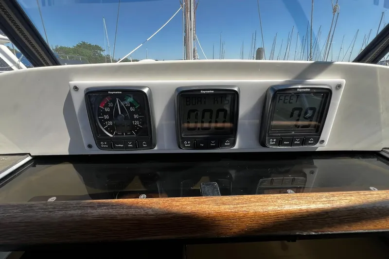 Slide: The Image of Control panel of a 2015 Hunter 37 sailboat with Raymarine instruments. - 18
