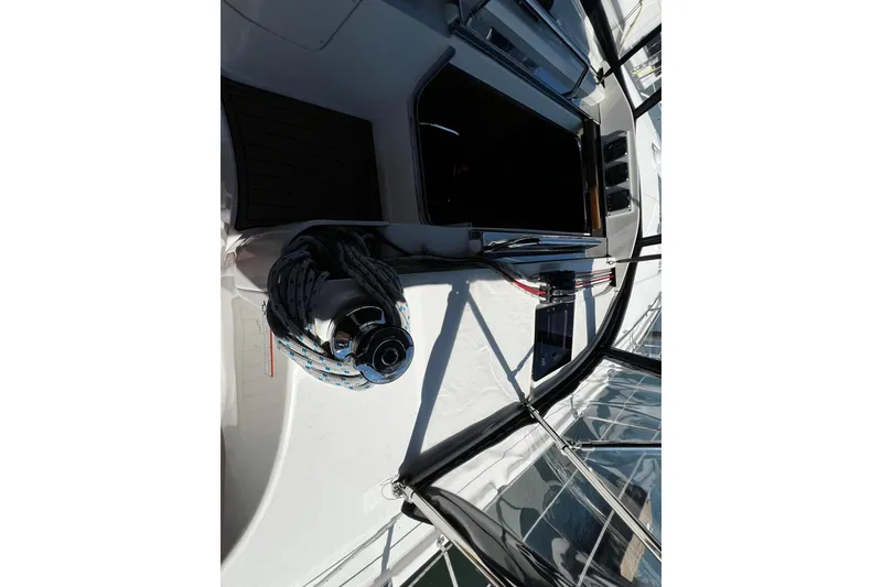 Slide: The Image of Cockpit view of a 2015 Hunter 37 sailboat with winch and ropes. - 11