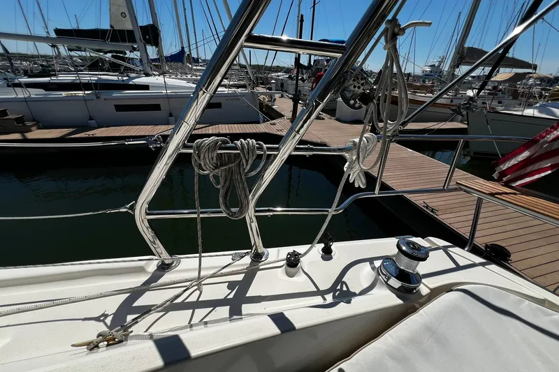 Slide: The Image of Hunter 37 sailboat deck with rigging and winch, docked at marina, 2015 model. - 59
