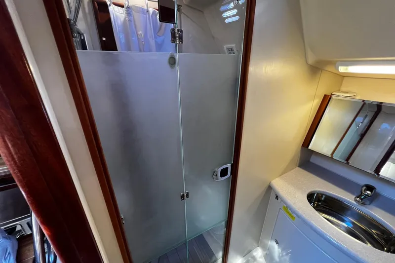 Slide: The Image of Luxurious bathroom interior of 2015 Hunter 37 yacht with glass shower and modern sink. - 37