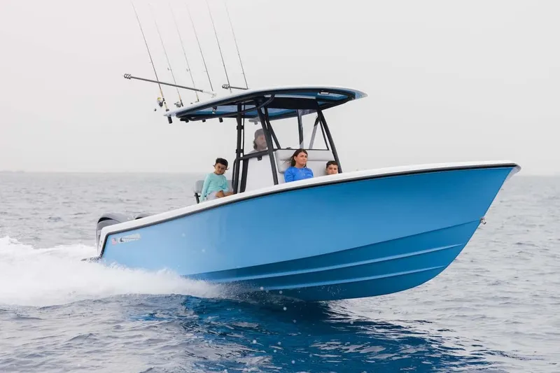 The Image of Manufacturer Provided Image: 2026 Contender 28 Tournament boat cruising on open water, featuring sleek blue design. - 1