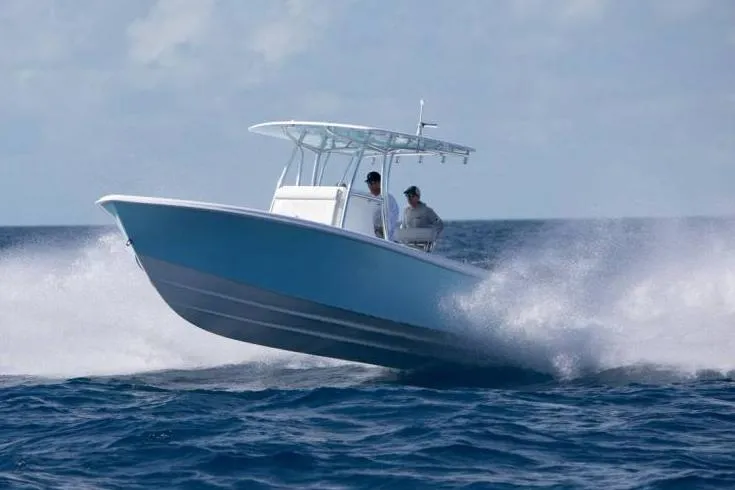 Slide: The Image of Manufacturer Provided Image: Contender 28 Tournament 2026 cruising on open sea, splashing water. - 2