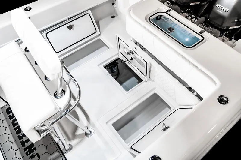 Slide: The Image of Manufacturer Provided Image: 2026 Contender 28 Tournament boat interior with storage compartments and seating. - 6