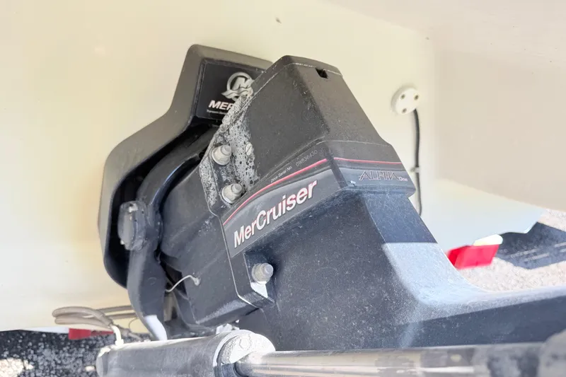 Slide: The Image of MerCruiser Alpha One outdrive on 2006 Sea Ray 210 Bow Rider boat. - 11