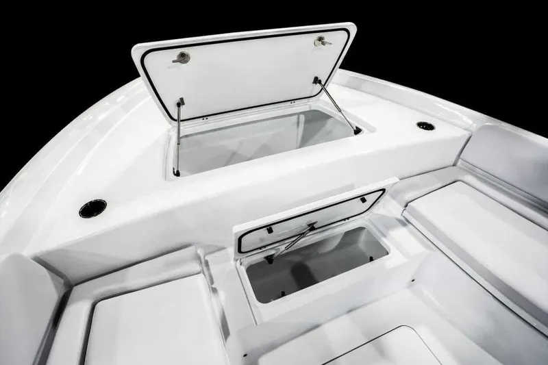 Slide: The Image of Manufacturer Provided Image: 2026 Contender 29 Bay boat interior with open storage compartments. - 3