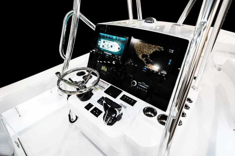 Slide: The Image of Manufacturer Provided Image: 2026 Contender 29 Bay boat dashboard with advanced navigation and control systems. - 6