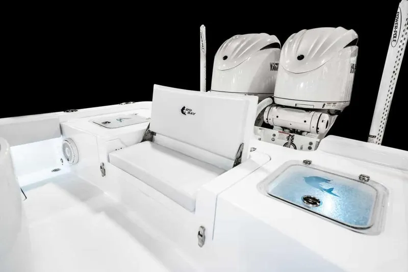 Slide: The Image of Manufacturer Provided Image: 2026 Contender 29 Bay boat interior with dual engines and seating. - 8