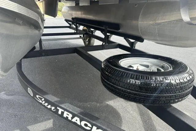Slide: The Image of Trailer for 2025 Sun Tracker Bass Buggy 18 DLX with spare tire. - 10