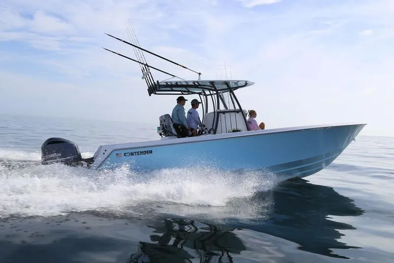 The Image of Manufacturer Provided Image: 2026 Contender 30 ST boat cruising on calm ocean waters. - 1