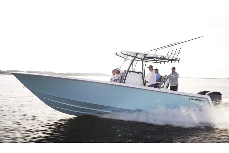 Slide: The Image of Manufacturer Provided Image: Contender 30 ST 2026 boat on water with passengers. - 4