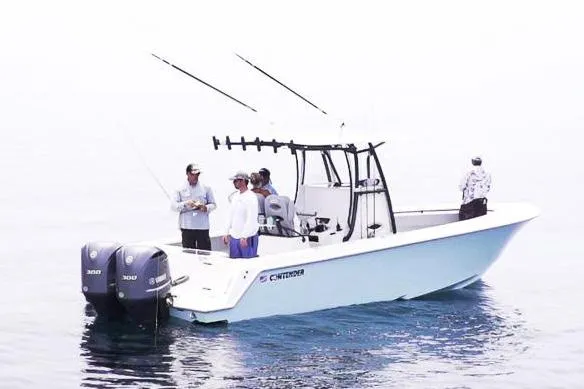 Slide: The Image of Manufacturer Provided Image: Contender 30 ST 2026 boat with anglers on calm water. - 6