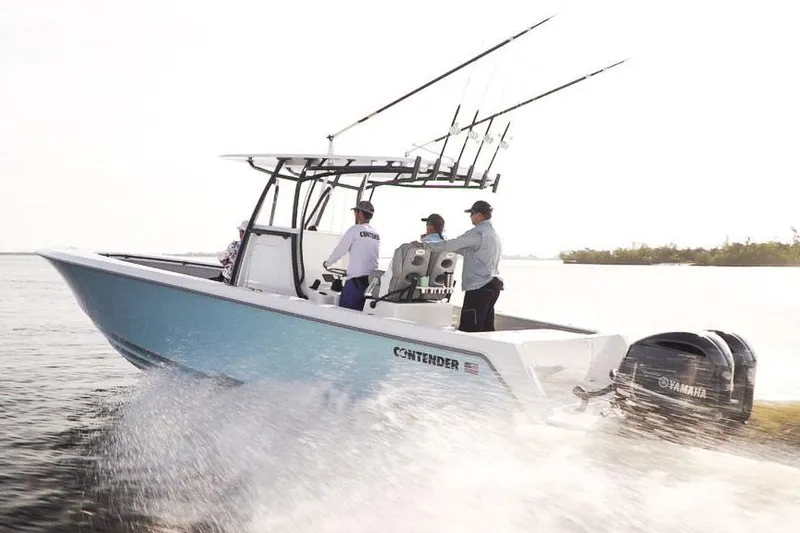 Slide: The Image of Manufacturer Provided Image: Contender 30 ST 2026 boat on water with anglers. - 2