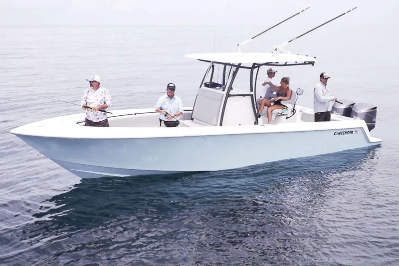 Slide: The Image of Manufacturer Provided Image: Contender 30 ST 2026 boat with anglers on calm water. - 5